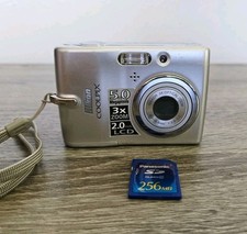 Nikon COOLPIX L10 5.0MP Digital Camera Silver with SD Card.