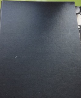 china stamps in black binder / album