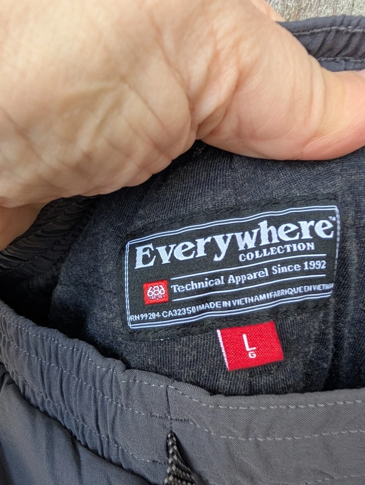 Pantalones de chándal 686 para hombre con aislamiento ligero de plumas grandes forrados gris lana merino Foto 3 de 4