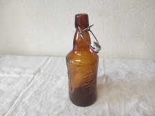 Ancienne bouteille de bière Fischer en verre avec bouchon en porcelaine 66 cl
