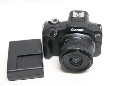 Canon EOS R100 24.2 MP Camera w/ 18-45mm F4.5-6.3 IS STM Lens  3k shutter count
