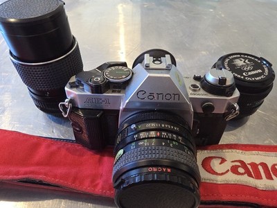 Canon AE-1 Program Silver Black 35mm with 3 Lenses, 166A Flash, bag and Strap