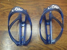 X-ONE LIGHT WEIGHT COMPOSITE PLASTIC  WATER BOTTLE CAGE SET (2) TRANSPARENT BLUE