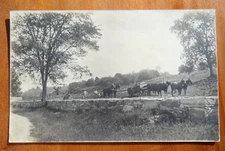 teams in the field, plowing, wagon, farming, sharp stone wall rppc postcard