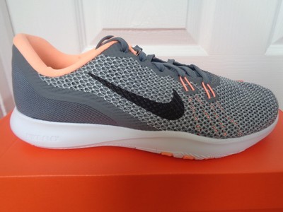 nike training flex trainers in grey with peach swoosh