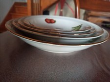 Lot de 4 plats de service LOUIS PIGOIS en porcelaine vintage