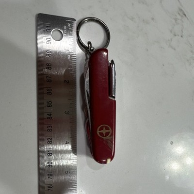 Red Multi-Tool with 7 Implements, Stainless Steel Blades, Key Ring Included