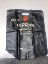Used Ozark Trail 5-Gallon Solar Compact Camp Shower