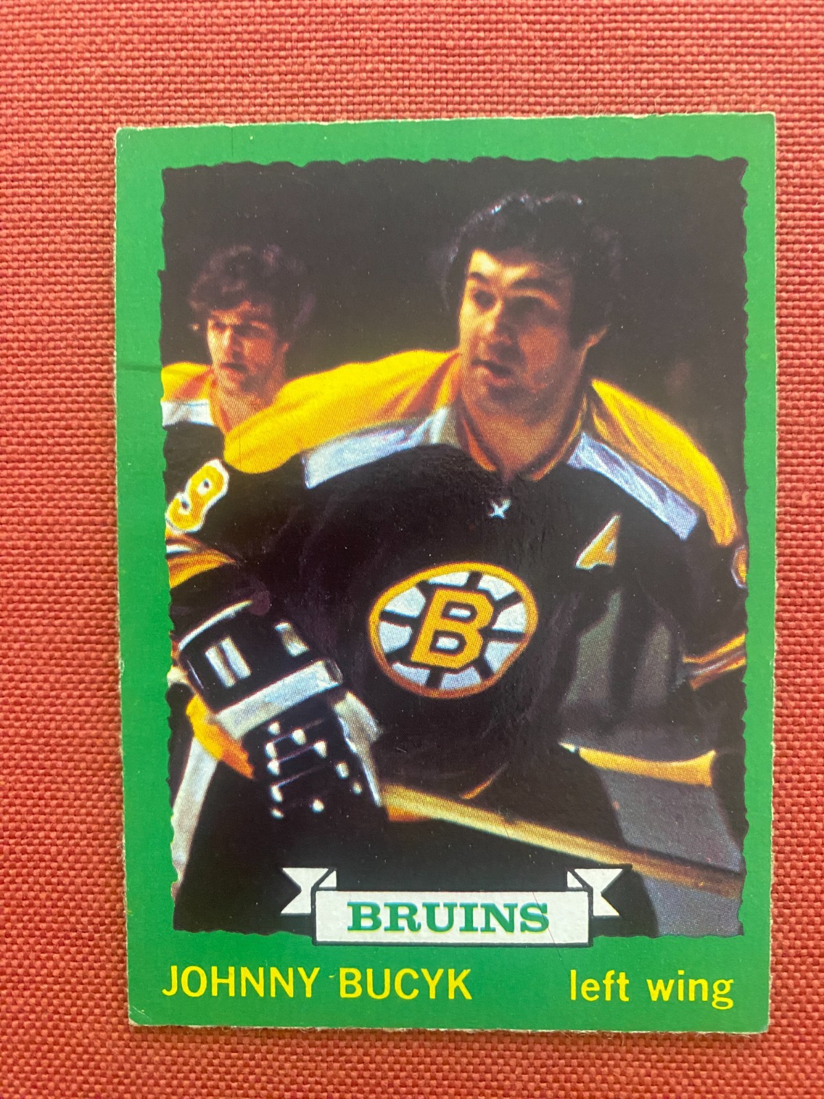 1973-74 O-Pee-Chee Johnny Bucyk NHL Hockey Card #147 Dark Back Boston Bruins