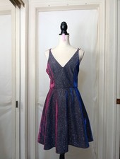 Xscape Women's formal gown& a metallic glitter finish.shimmering purple Size 10