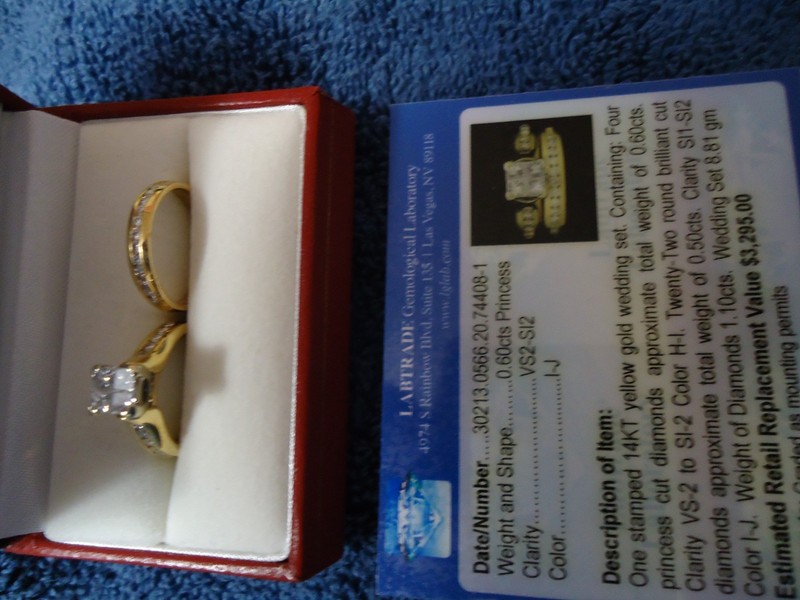 14k yellow gold wedding set w/4 Princess cut diamonds .60cts. size 6