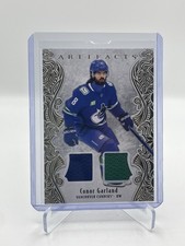 Conor Garland 2025-26 Upper Deck Artifacts Gold Material Dual Jersey /299