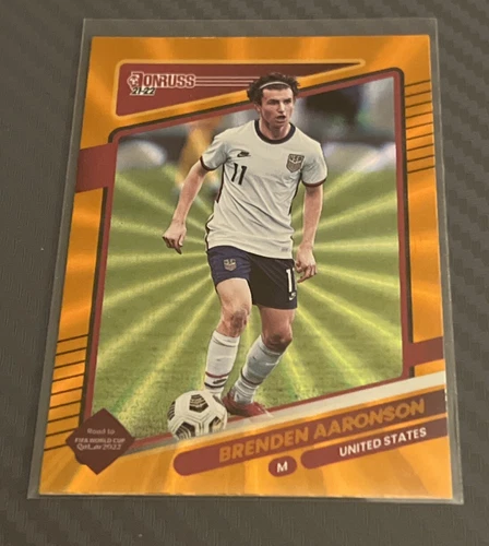 2021-22 Donruss Road To Qatar Orange Holo Laser #165 Brenden Aaronson