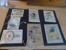 collection of early 20th century greetings cards
