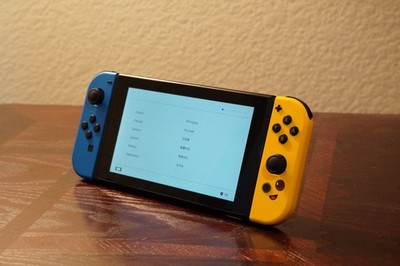 Nintendo Switch with Fortnite Joy-Cons, Carrying Case, and Charger (HAC-001-01)