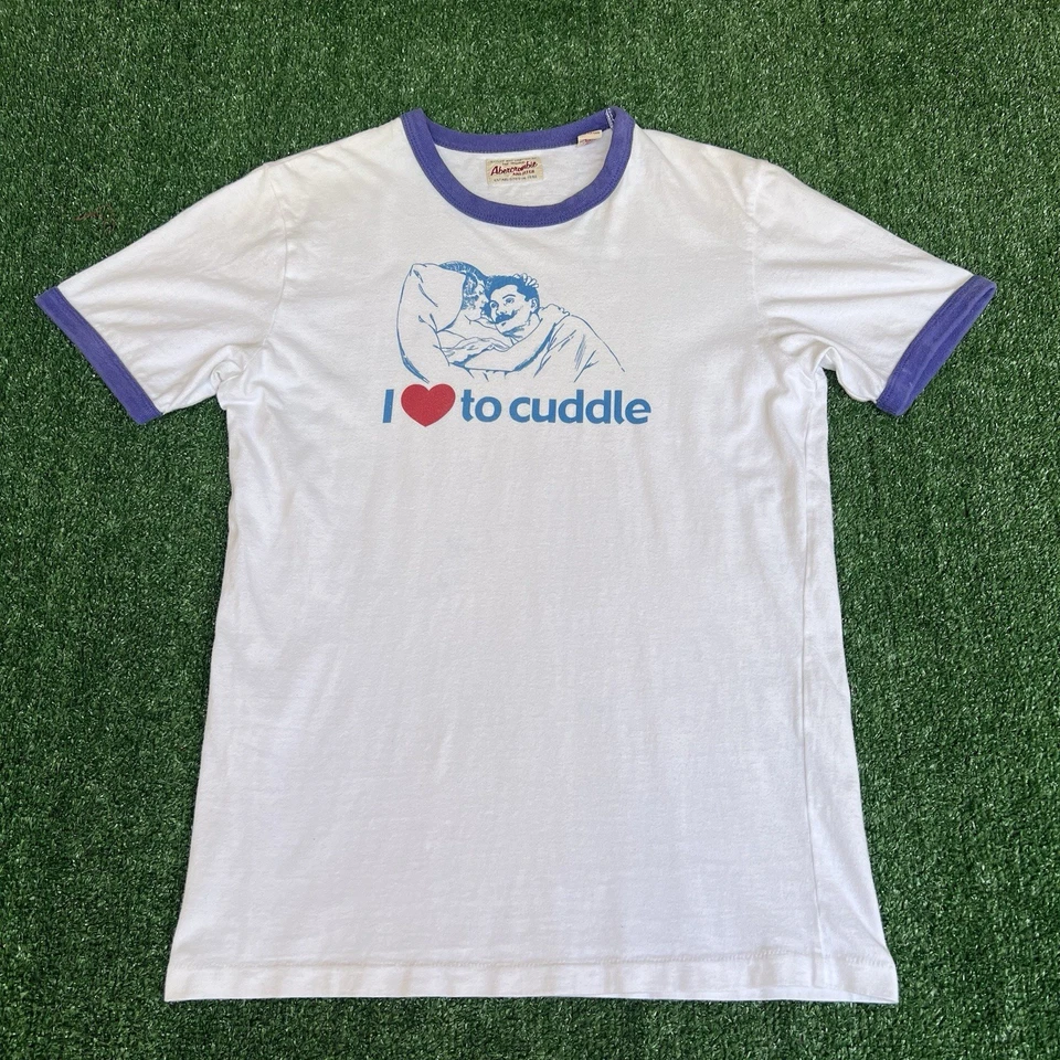 Camiseta con timbre blanca mediana vintage Y2K para hombre Abercrombie Funny I Love To Cuddle Foto 2 de 4