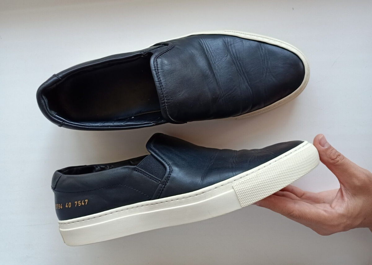 Woman by Common Projects Black Leather Slip On Loafer Woman by Common Projects Black Leather Slip On Loafer