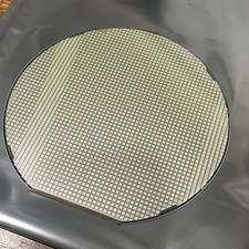 One 6 Inch Silicon Wafer With Small Square Iridescent Die