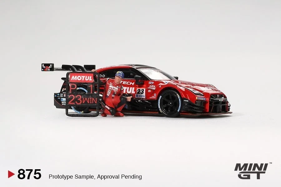 Nissan GT-R NISMO MOTUL #23 Suzuka Winner W/Matsuda Figure 1:64 Die Cast Mini GT - Immagine 2 di 4