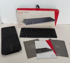Teclado Bluetooth móvil Microsoft Wedge 2012 modelo 1521 con cubierta caja y folleto