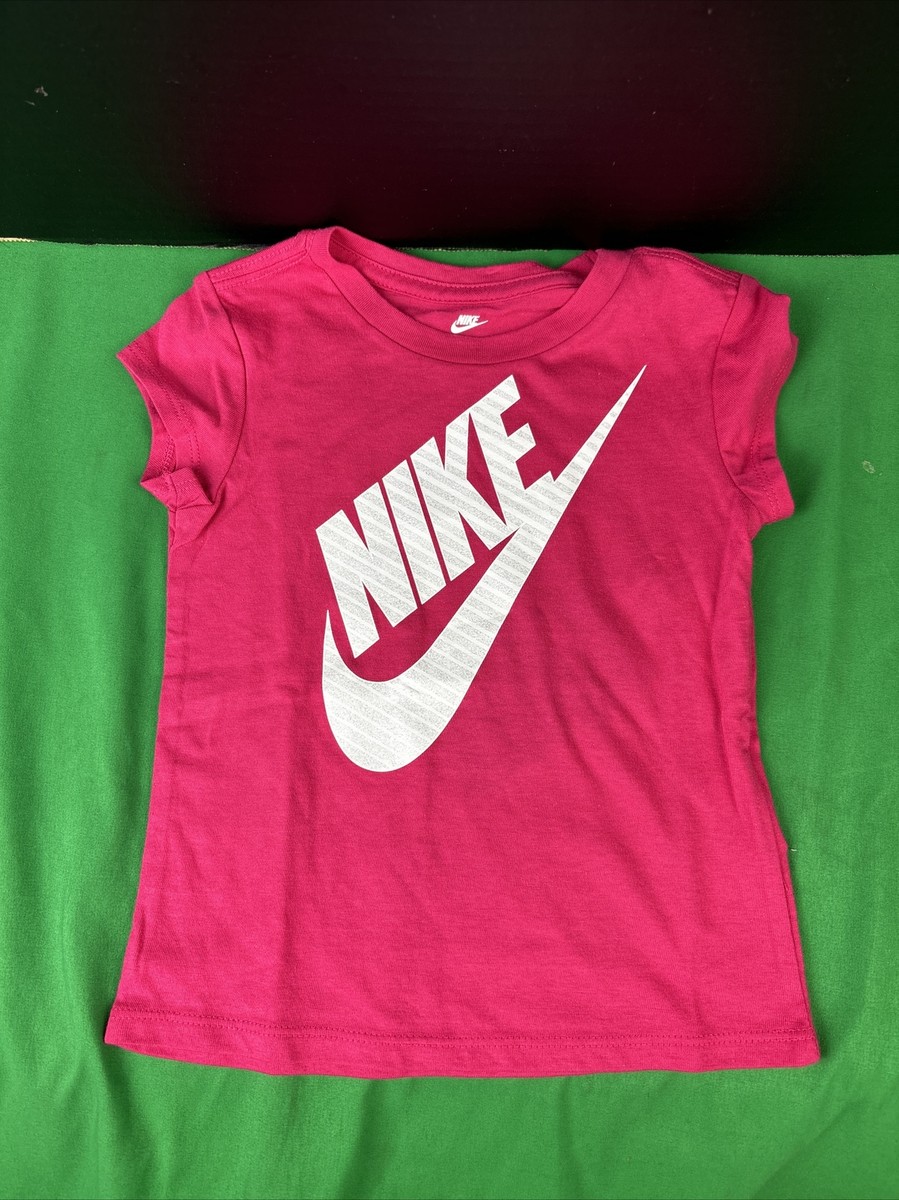 pink and red nike shirt