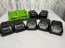 GREENWORKS Battery Charger and 2x4AH, 2x2AH, 3x1.5AH 24V Max Batteries and Bag