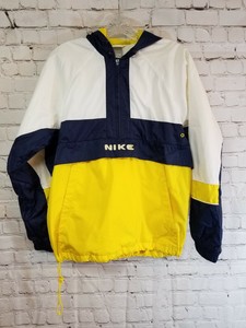 yellow and white nike windbreaker