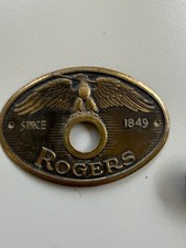 Vintage Rogers Brass Eagle Badge with grommet...