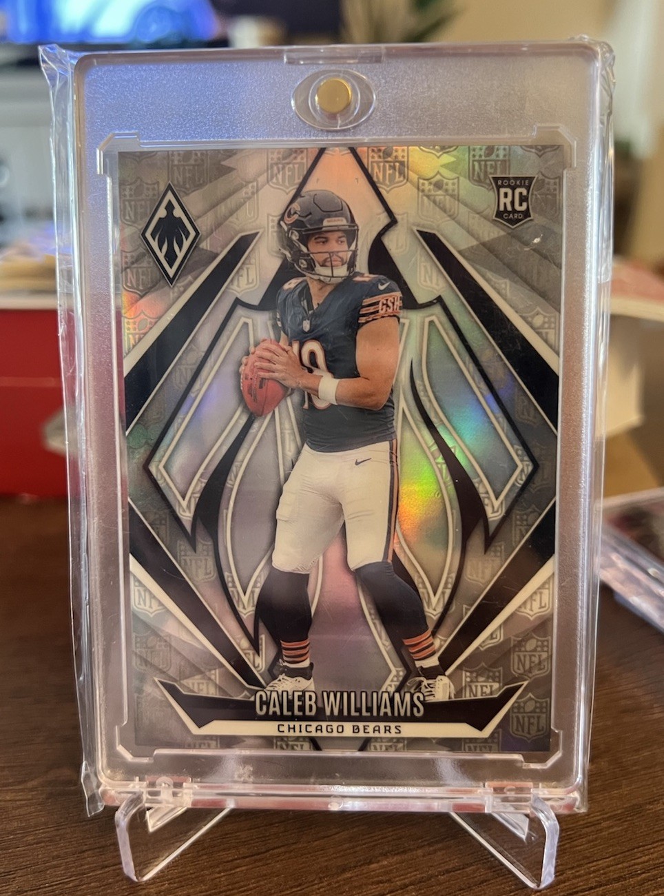 2024 Panini Phoenix - Rookies Caleb Williams #151 NFL Shield /150 (RC)