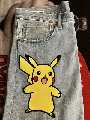 Levi’s Pokemon 551Z Authentic Straight Jeans Pikachu size 34X30 Light Wash 