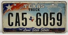 TEXAS LONE STAR STATE TRUCK LICENSE PLATE RED WHITE BLUE EXPIRATION 1999 READ