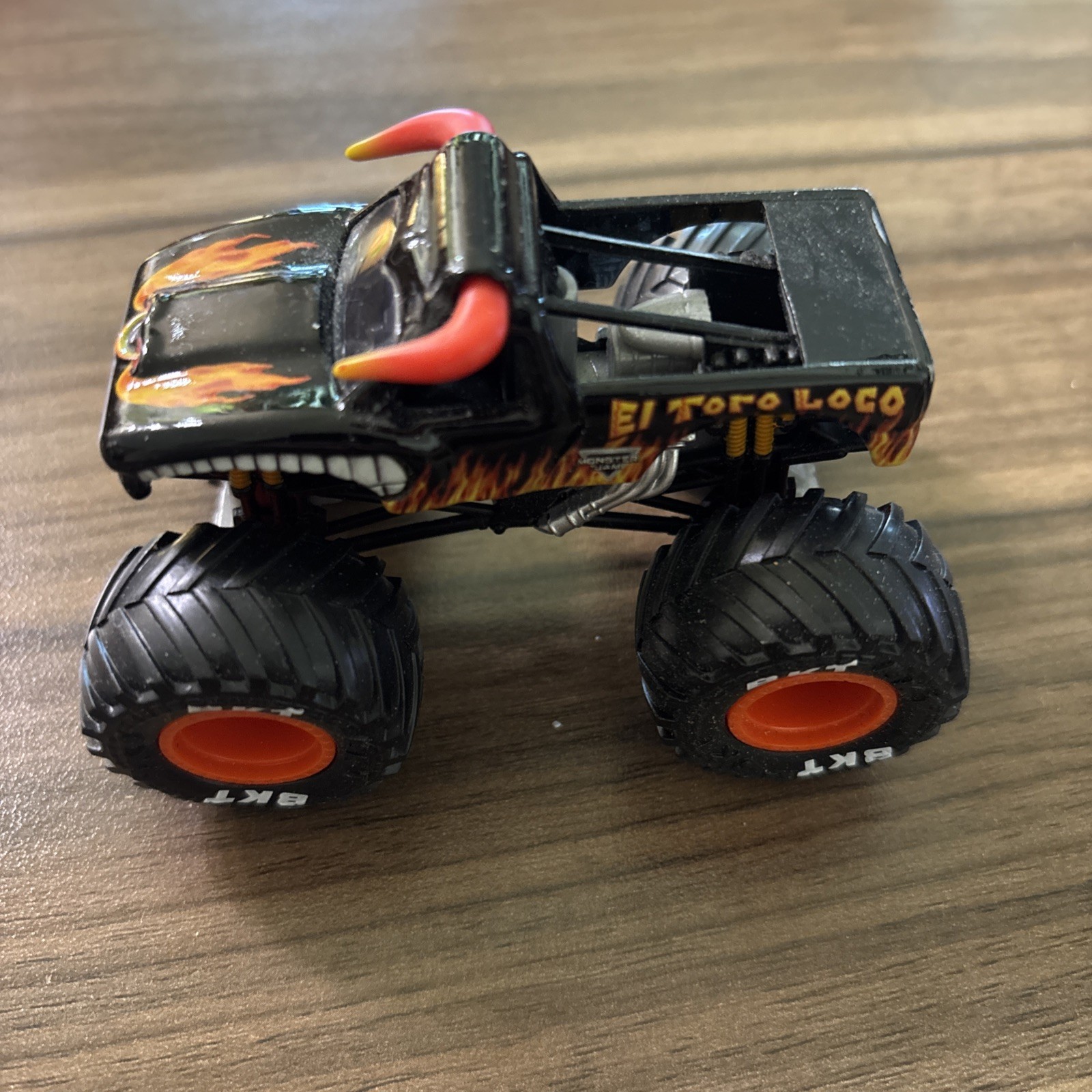 Monster Jam El Toro Loco Black Loose Truck 1/64 Diecast BKT Orange Wheels