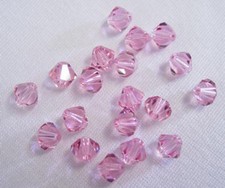 24 Swarovski Crystal Beads  5328 Xilion Lt. Rose 6MM