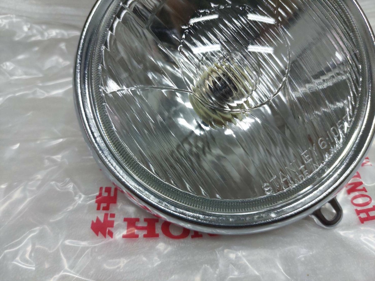 HONDA HEADLIGHT CB100 CL100 CB125S CD125S SL90K SL100 NOS HONDA HEADLIGHT CB100 CL100 CB125S CD125S SL90K SL100 NOS