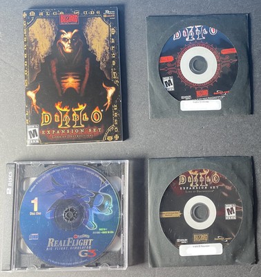 Real Flight RC Flight Simulator (2 CD) AND Diablo 2 Expansion Set (2 CD).