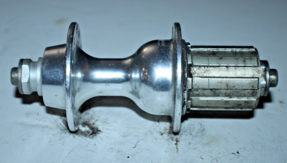 Buje trasero de carreras buje libre plateado 24H 131 mm Touring Road MTB grava remitente de EE. UU. :) Foto 4 de 4