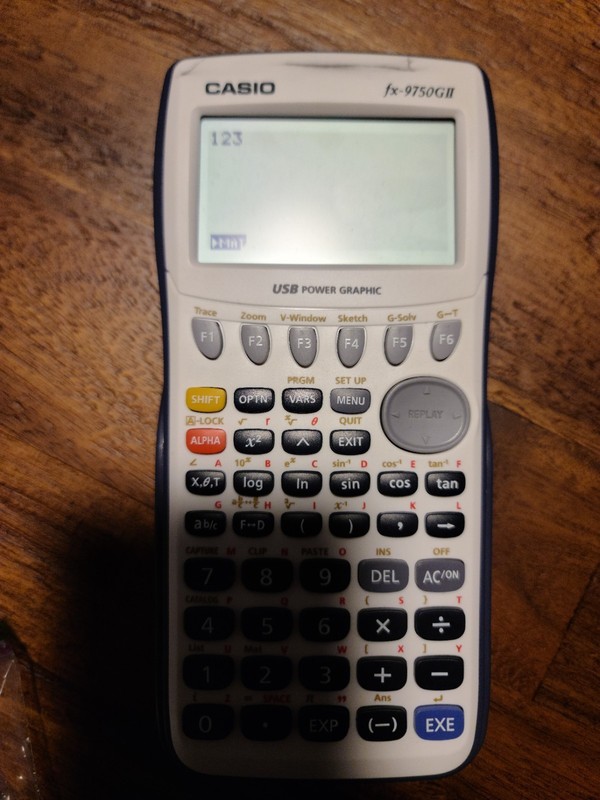 Casio fx-9750GII Graphing Calculator – Fully Functional + Cover