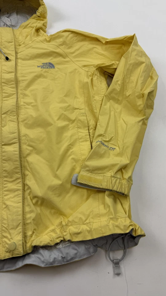 Chaqueta para mujer The North Face pequeña amarilla HyVent DT con capucha impermeable carcasa para lluvia Foto 2 de 4