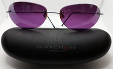 Marchon Airlock Titanium Sunglasses. Made in Italy, Rimless, with original case.