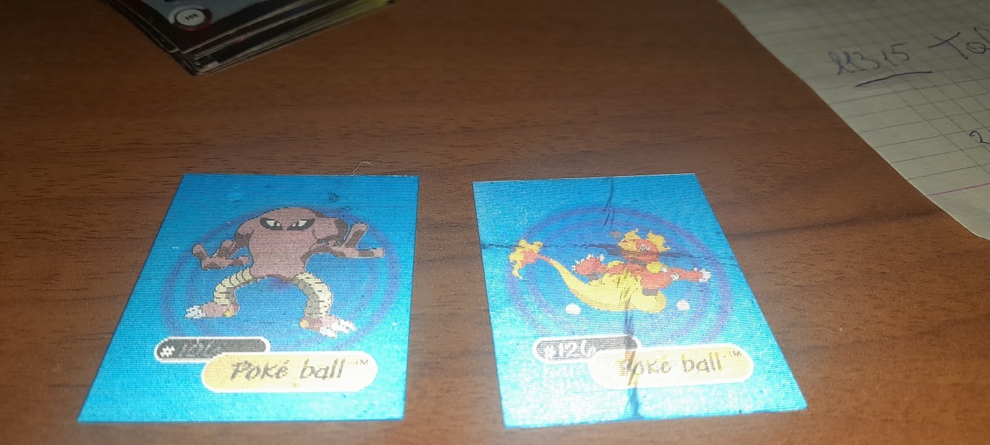 2 Card Pokemon lenticolare Poke ball Himonee+Hagmar YOGA Acchiappali tutti