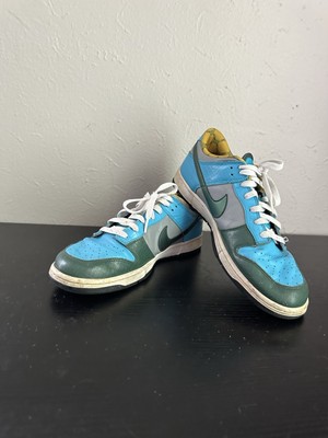 Leather Nike Retro Dunks Low with Blue Snakeskin, Green Swoosh and Grey accent. 