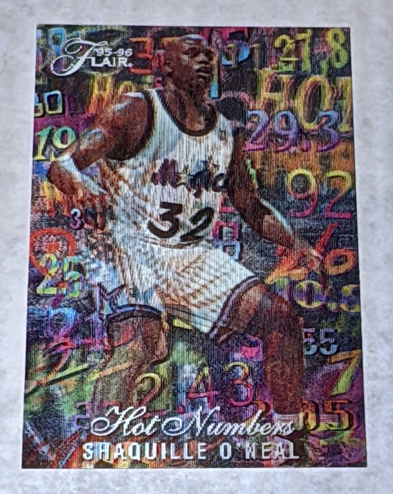 1995-96 Flair Hot Numbers #11 Shaquille O'Neal and two other Shaq cards.