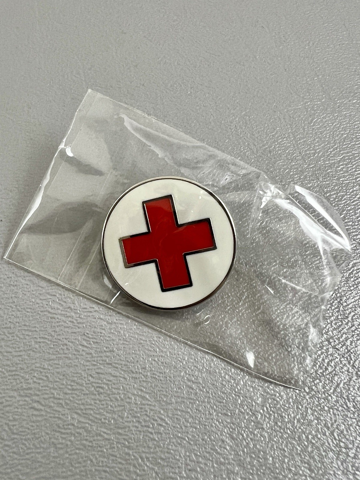 Red Cross Enamel Lapel Pin Round White Medical Humanitarian Aid New