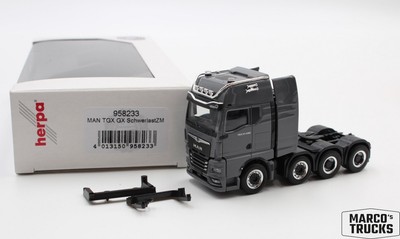 Herpa MAN TGX GX 8x4 tractor unit nardo gray Löwe No. 958233 1:87