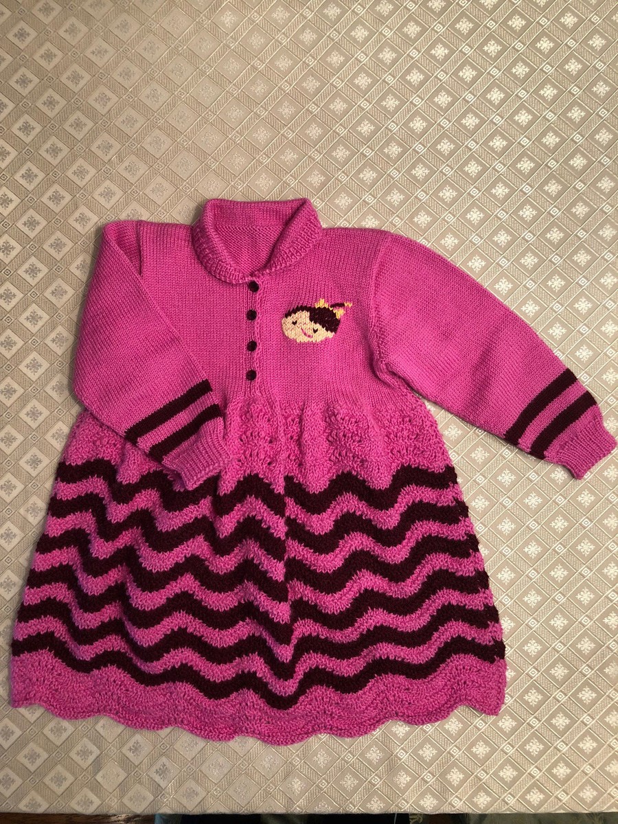 a pink wool knitted dress Girls hand knit dress, pink, 100% Neckline: Strapless straight-across
