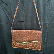 Vintage, leather, alligator embossed envelope style purse.