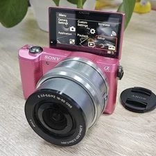 Near Mint Sony Alpha a5000 Pink Mirrorless Digital Camera + 16-50mm Lens English