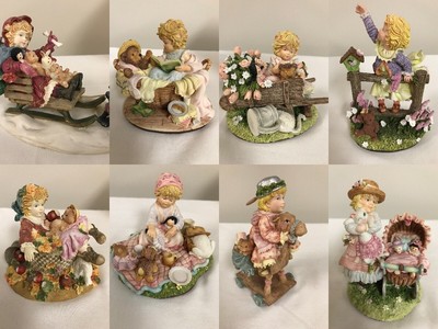 Enesco Laura's Attic Figure by Karen Hahn, Limited Edition Girl playing - $8 ea