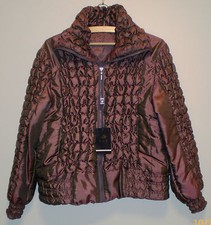 Nice short puffer jacket. Size L.