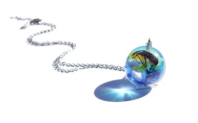Parachute gliding in the cloudy sky pendant/necklace
